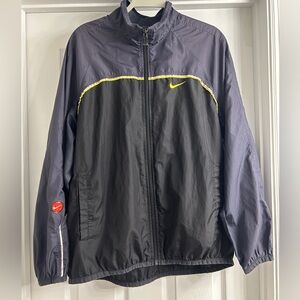 Y2K Vintage Nike
Windbreaker Blue and Yellow